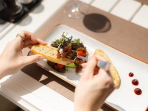 Guest enjoying Tuna Tartare at Sunset Restaurant in Dubrovnik