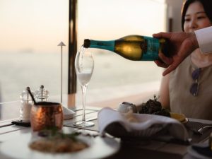 Wine being served at Sunset Restaurant overlooking the Adriatic Sea